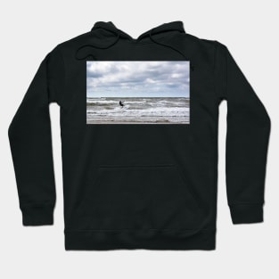 Kitesurfer is riding the waves of Baltic sea Hoodie